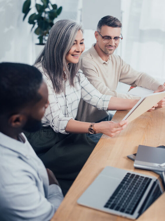 A Vancouver web agency team looking over their web hosting plans.